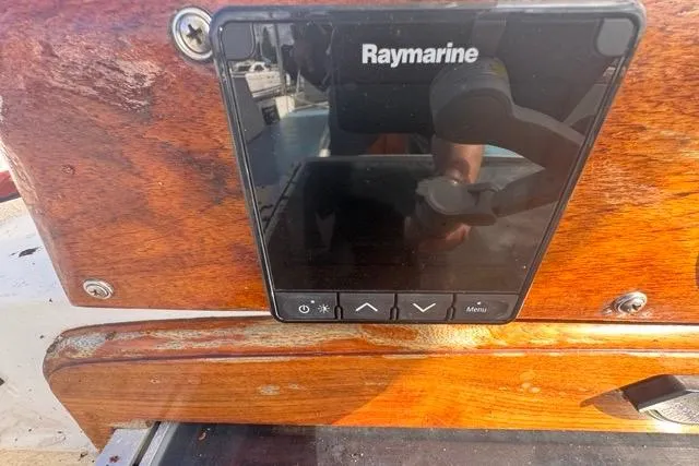 Slide: The Image of Raymarine navigation display on 1989 Hylas 44 sailboat with wooden paneling. - 40