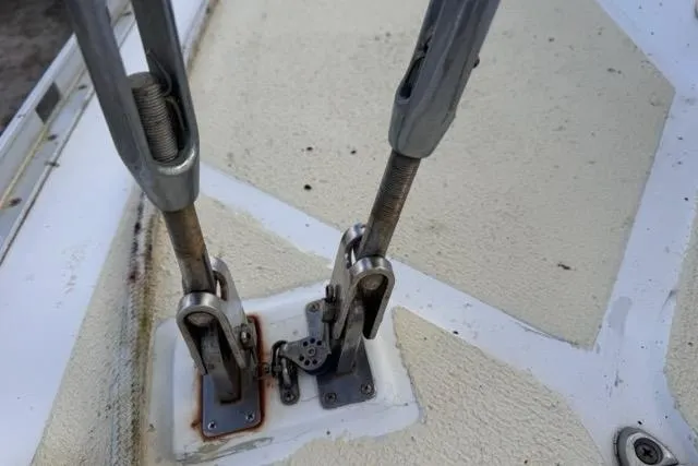 Slide: The Image of Close-up of rigging hardware on a 1989 Hylas 44 sailboat deck. - 48