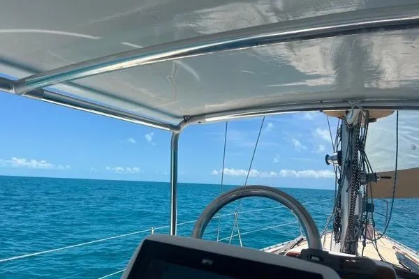 Slide: The Image of Green 1989 Hylas 44 sailboat on stands, clear sky background. - 9