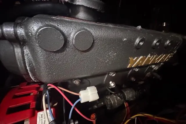 Slide: The Image of Close-up of a Yamaha engine in a 1989 Hylas 44 sailboat. - 90