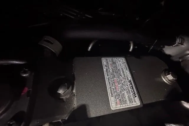 Slide: The Image of Engine component of a 1989 Hylas 44, featuring a detailed label. - 94