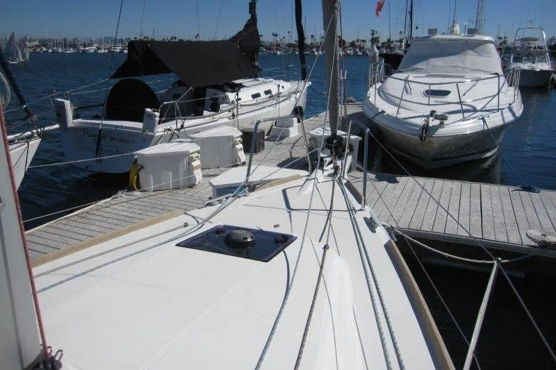 Slide: The Image of Jeanneau Sun Odyssey 349 sailboat docked at marina, 2021 model. - 38