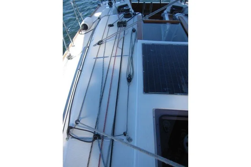 Slide: The Image of 2021 Jeanneau Sun Odyssey 349 deck with rigging and solar panel. - 60
