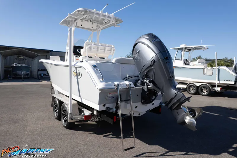 Slide: The Image of 2025 Sea Hunt Ultra 229 boat with Yamaha outboard motor on trailer. - 15