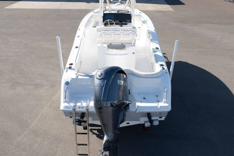 Slide: The Image of 2025 Sea Hunt Ultra 229 boat with Yamaha 200 engine, rear view. - 21