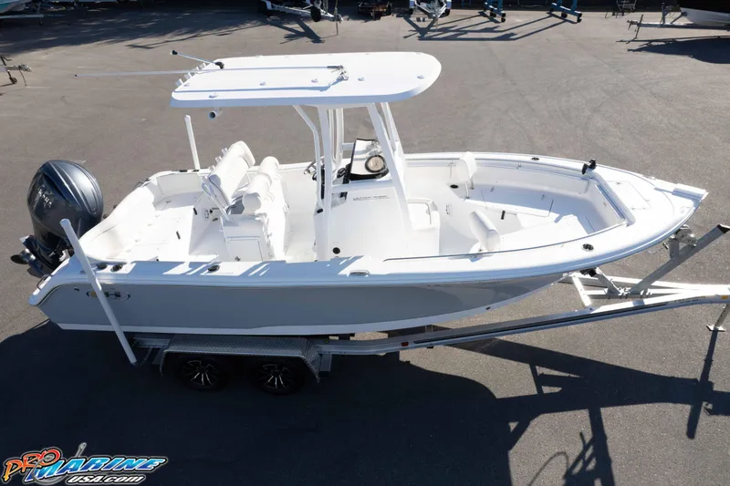 Slide: The Image of 2025 Sea Hunt Ultra 229 boat on trailer, featuring sleek design and modern amenities. - 29