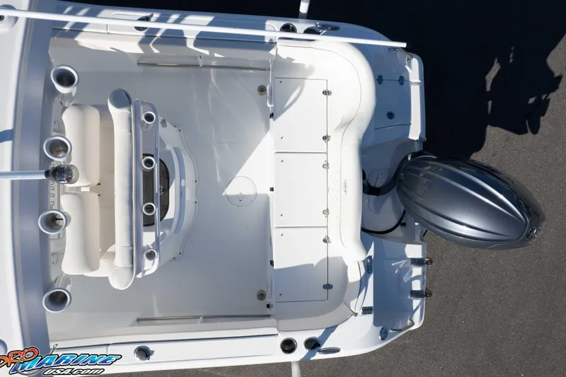 Slide: The Image of Overhead view of 2025 Sea Hunt Ultra 229 boat deck with motor. - 32