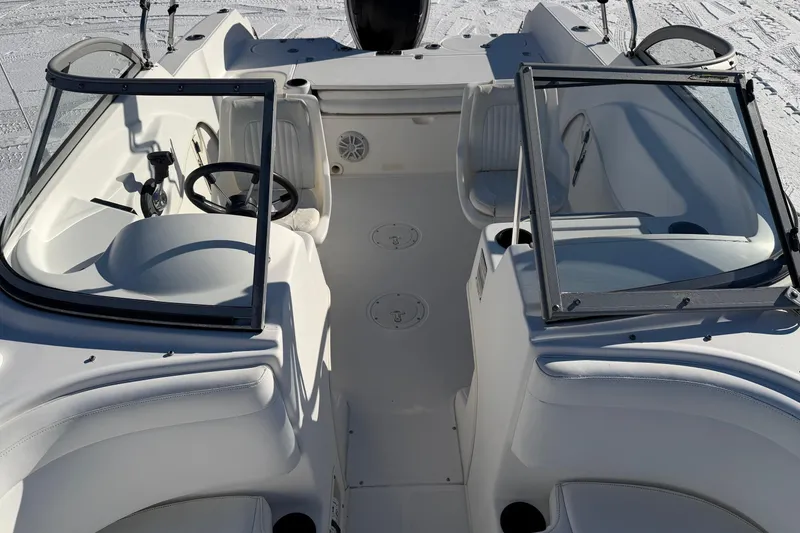 Slide: The Image of 2006 Boston Whaler 180 Ventura boat interior with dual consoles and seating. - 6