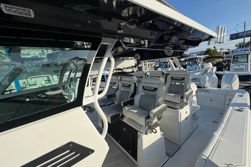 Slide: The Image of 2026 Blackfin 400 CC boat interior with luxurious seating and modern design. - 13