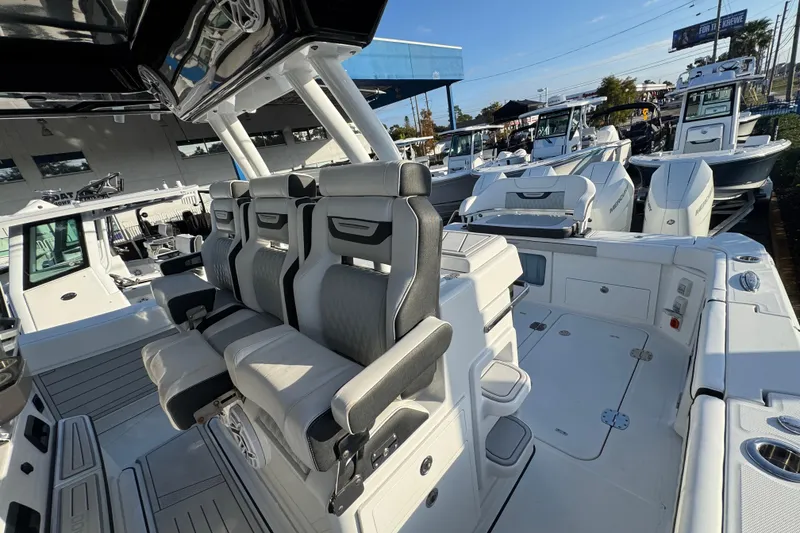 Slide: The Image of 2026 Blackfin 400 CC boat interior with luxurious seating and modern design. - 14