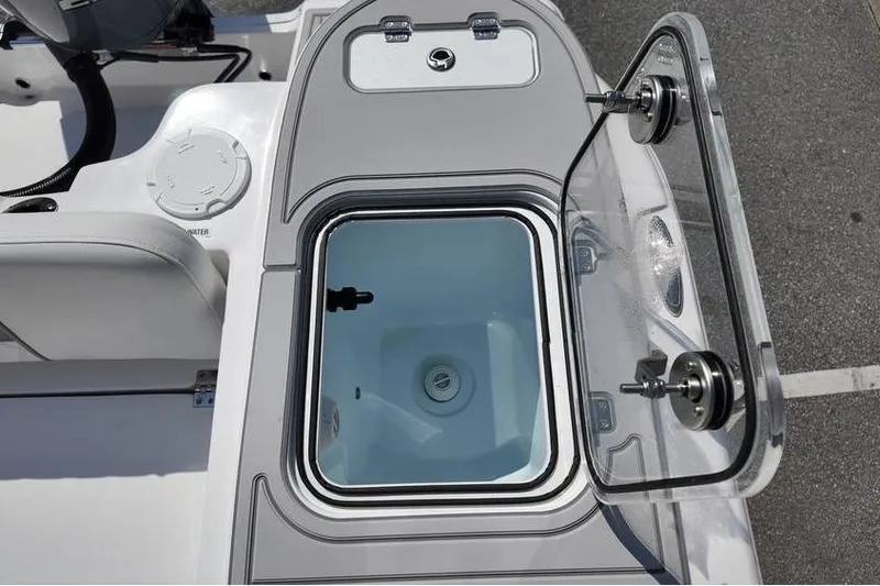 Slide: The Image of Open storage compartment on 2026 Sea Fox 248 Commander boat, featuring sleek design and functionality. - 13