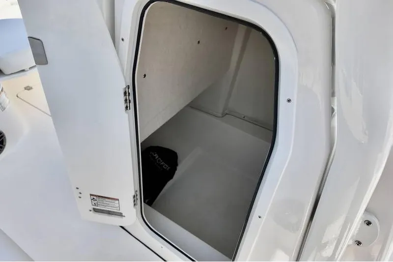 Slide: The Image of Open storage compartment on 2026 Sea Fox 248 Commander boat. - 18