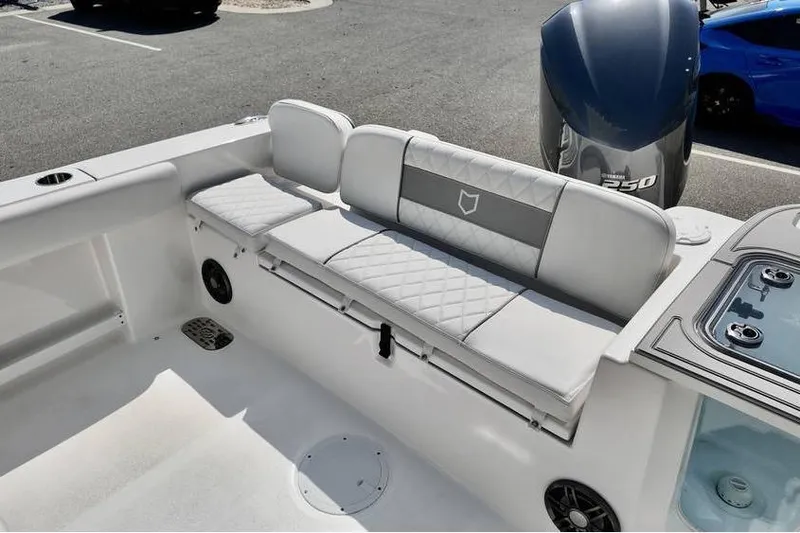Slide: The Image of 2026 Sea Fox 248 Commander boat interior with cushioned seating and Yamaha 250 engine. - 20