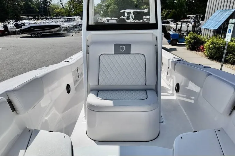 Slide: The Image of 2026 Sea Fox 248 Commander boat interior with cushioned seating and sleek design. - 8