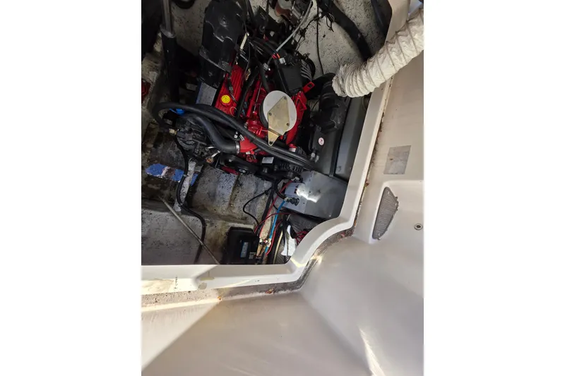 Slide: The Image of Engine compartment of a 2005 Rinker 300 Express Cruiser boat. - 29