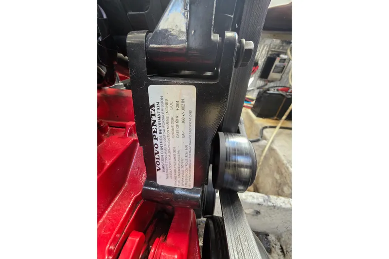 Slide: The Image of Close-up of a Volvo Penta engine component in a 2005 Rinker 300 Express Cruiser. - 30
