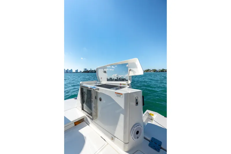 Slide: The Image of Saxdor 400 GTO 2025 boat on water, featuring sleek design and modern amenities. - 13