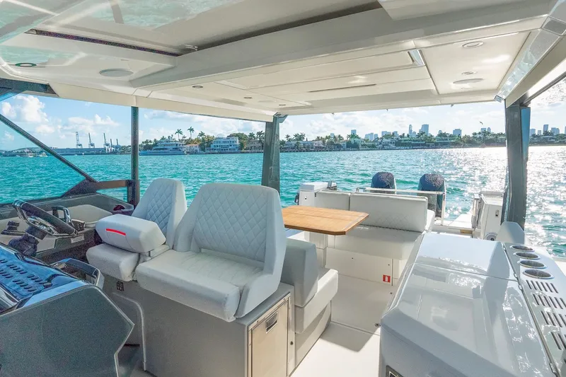 Slide: The Image of Luxurious 2025 Saxdor 400 GTO yacht interior with ocean view and modern seating. - 6