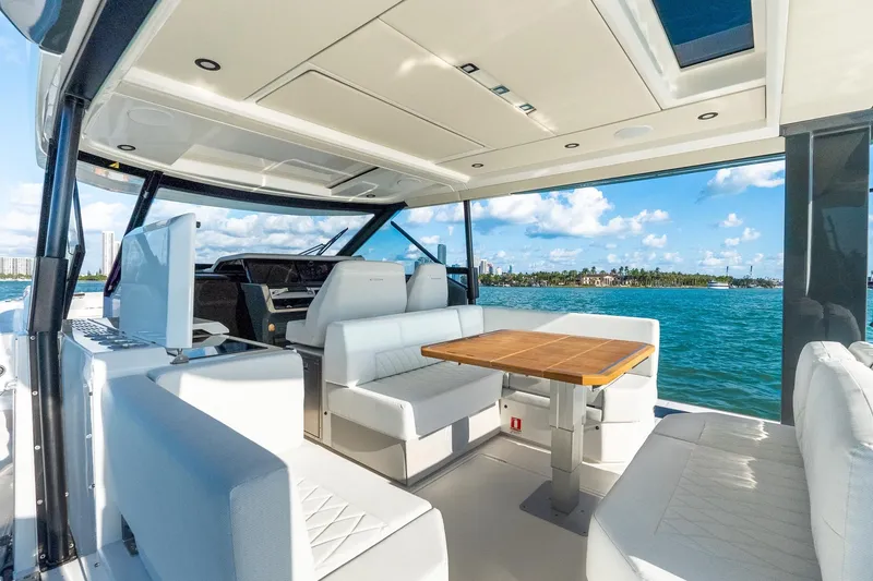 Slide: The Image of Luxurious interior of 2025 Saxdor 400 GTO yacht with ocean view and modern seating. - 8