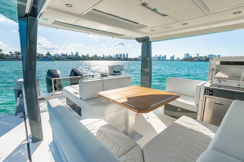 Slide: The Image of Luxurious 2025 Saxdor 400 GTO yacht interior with scenic waterfront view. - 9