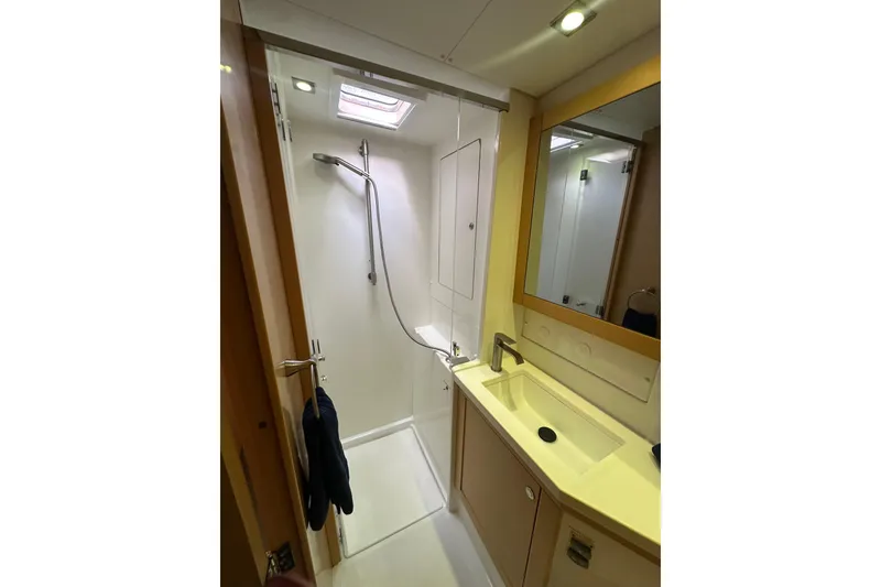 Slide: The Image of Modern bathroom in 2014 Lagoon 450 F yacht with shower and sink. - 18