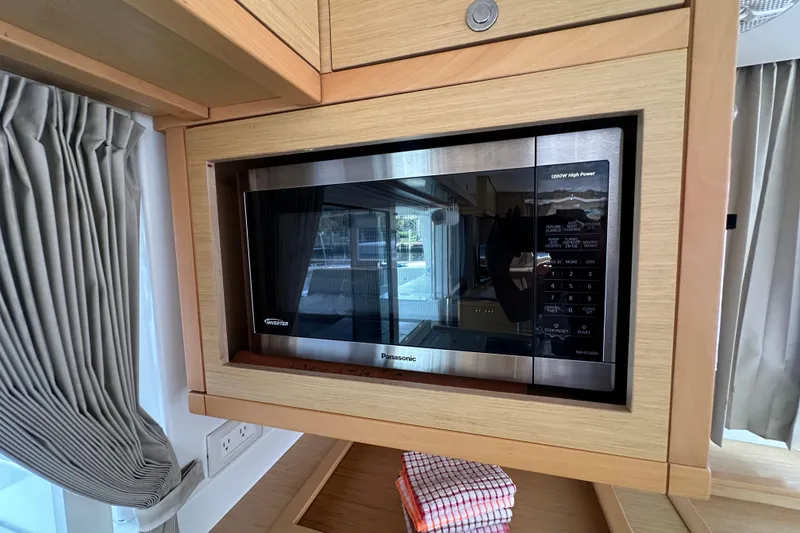 Slide: The Image of Built-in Panasonic microwave in Lagoon 450 F yacht kitchen, 2014 model. - 2