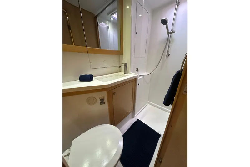 Slide: The Image of Bathroom interior of 2014 Lagoon 450 F yacht, featuring shower and sink. - 25