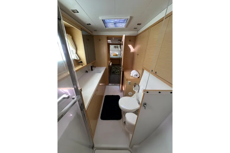 Slide: The Image of Luxurious bathroom interior of 2014 Lagoon 450 F yacht, featuring modern amenities and sleek design. - 38
