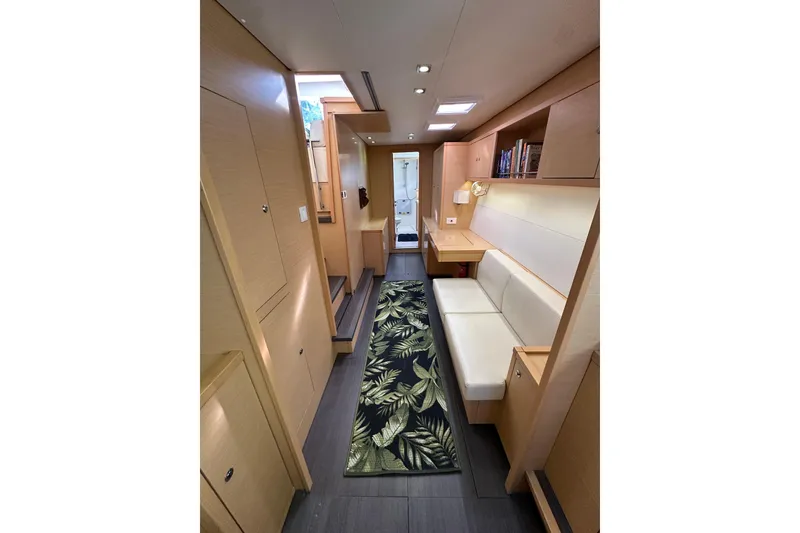 Slide: The Image of Interior of 2014 Lagoon 450 F yacht with modern design and tropical rug. - 43