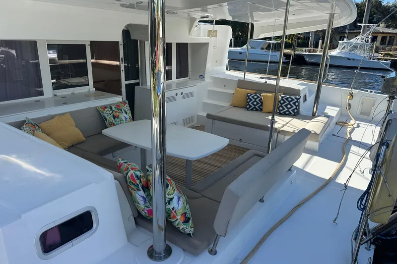 Slide: The Image of Spacious deck of 2014 Lagoon 450 F catamaran with comfortable seating and colorful cushions. - 68