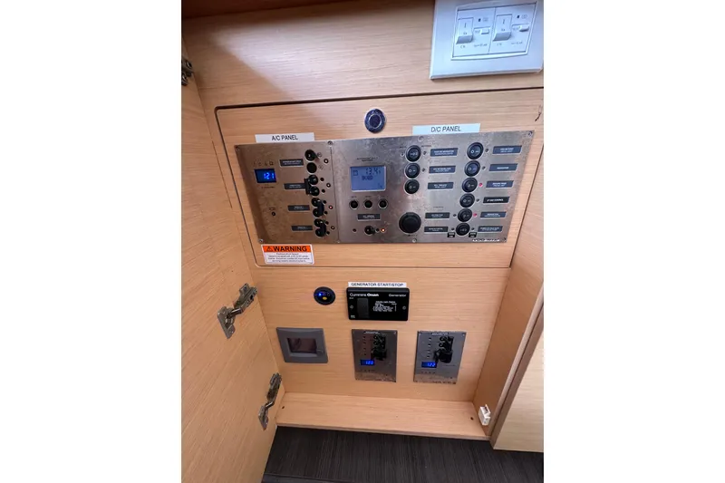 Slide: The Image of Electrical control panel on a 2014 Lagoon 450 F catamaran. - 8