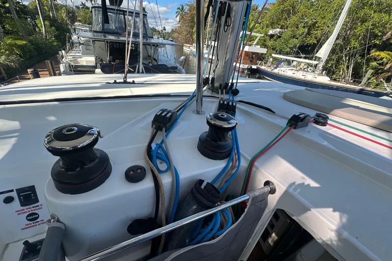 Slide: The Image of Cockpit view of a 2019 Lagoon 42 sailboat with winches and ropes. - 22