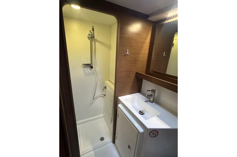 Slide: The Image of Bathroom interior of 2019 Lagoon 42 catamaran with shower and sink. - 57