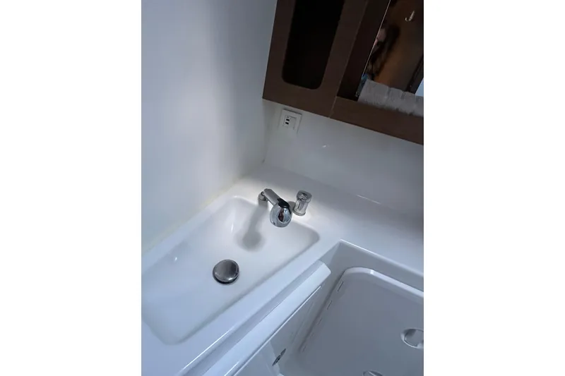 Slide: The Image of Modern bathroom sink in 2019 Lagoon 42 yacht, featuring sleek design and fixtures. - 58
