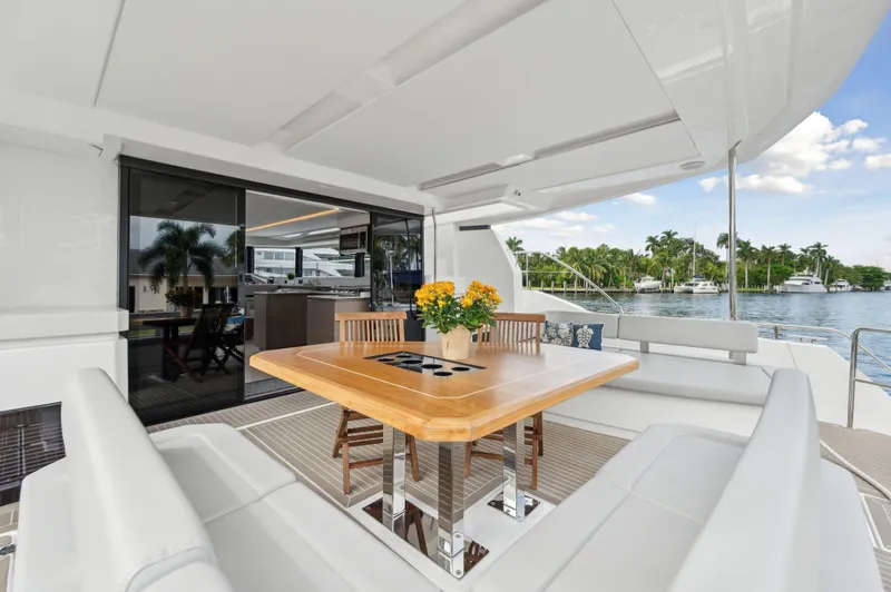 Slide: The Image of Luxurious 2024 Leopard 53 Powercat yacht with elegant outdoor dining area. - 43