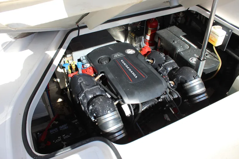 Slide: The Image of 2018 Regal 28 Express engine compartment with Volvo Penta engine. - 44