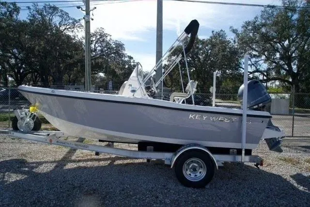 The Image of 2026 Key West 179 FS boat on trailer, parked outdoors. - 1