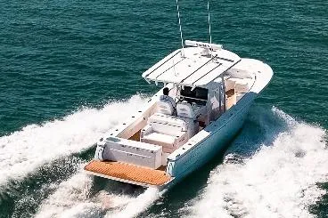 The Image of 2026 Southport 30 FE Volvo Penta boat cruising on open sea. - 1