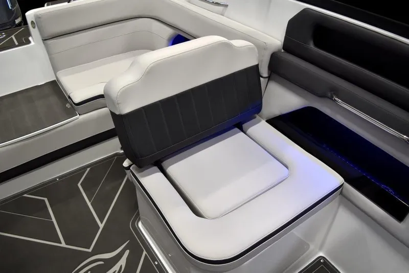 Slide: The Image of 2019 Rinker Q3 OB boat interior seating with modern design and LED lighting. - 10