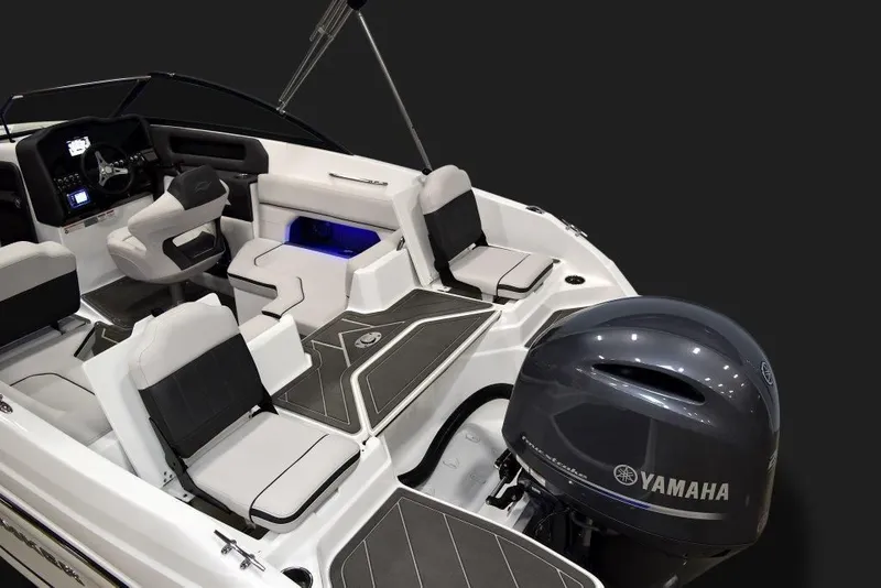 Slide: The Image of 2019 Rinker Q3 OB boat interior with Yamaha outboard motor. - 11