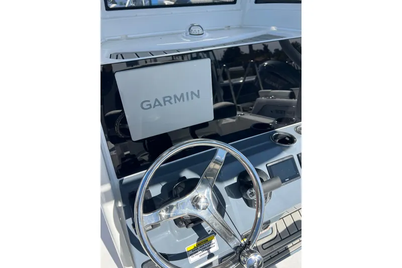 Slide: The Image of 2026 Tidewater 2410 Bay Max boat dashboard with Garmin navigation system. - 5