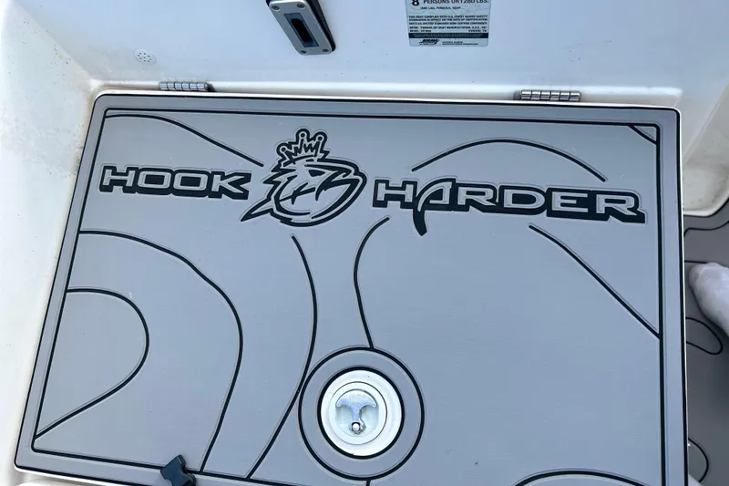 Slide: The Image of 2019 Yamaha Boats 190 FSH Sport deck with "Hook Harder" design. - 13