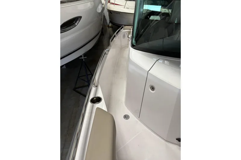 Slide: The Image of 2022 Axopar 28 CABIN boat interior, showcasing sleek design and modern features. - 10