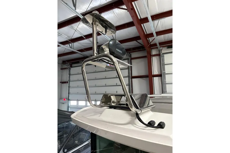 Slide: The Image of 2022 Axopar 28 CABIN boat radar and antenna setup in a garage. - 19