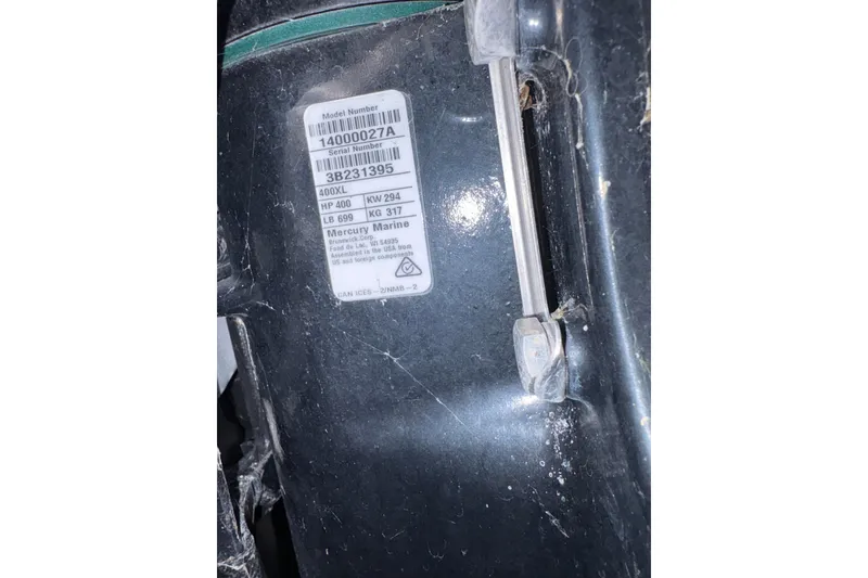 Slide: The Image of Label on Axopar 28 CABIN 2022 boat engine, displaying model and serial numbers. - 39