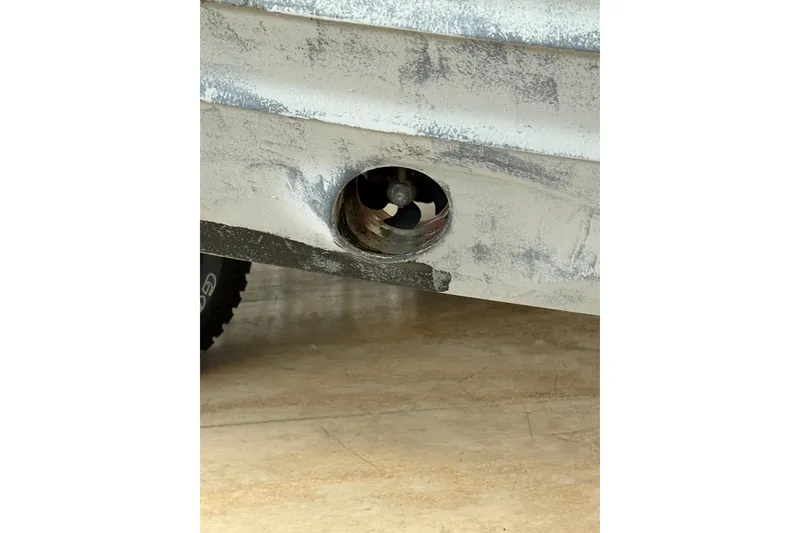 Slide: The Image of Damaged hull of 2022 Axopar 28 CABIN boat with visible propeller. - 5