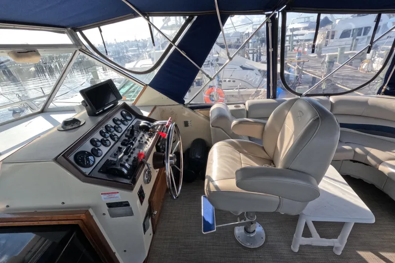 Slide: The Image of 1985 Chris-Craft 381 Catalina helm with modern controls and comfortable seating. - 32