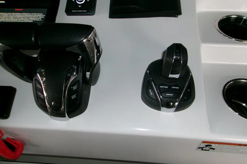 Slide: The Image of Control panel of 2023 Sportsman Open 282 Center Console with Fusion audio system. - 14