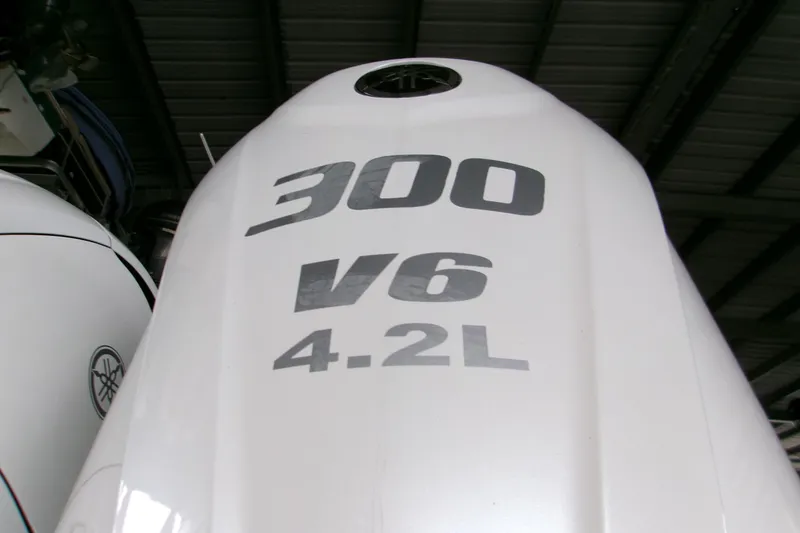 Slide: The Image of 2023 Sportsman Open 282 Center Console boat detail with Seakeeper stabilizer. - 2