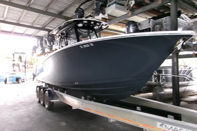 Slide: The Image of 2023 Sportsman Open 282 Center Console logo on white surface. - 20